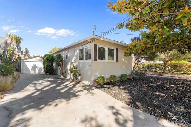 532 Vista Ct, Millbrae, CA 94030 - view of front of home featuring an outdoor structure, a garage, and concrete driveway