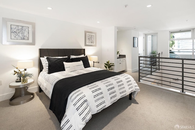 carpeted bedroom with recessed lighting and baseboards