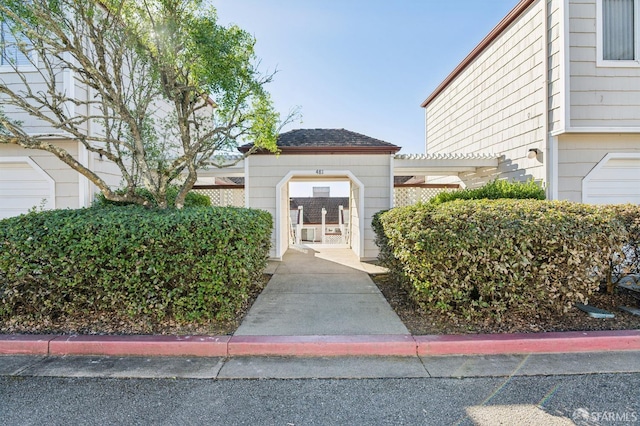 surrounding community with a pergola