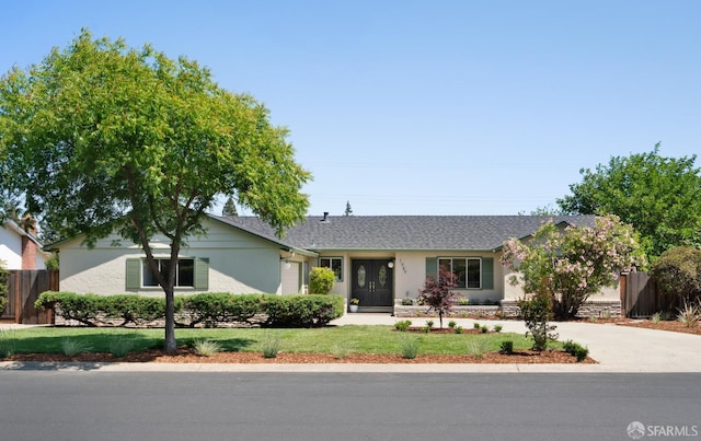 1989 Scott Ln, Los Altos, CA 94024 - ranch-style home with stucco siding, concrete driveway, and an attached garage