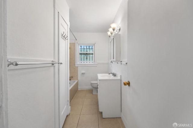 full bath featuring vanity, baseboards, tile patterned flooring, toilet, and bathtub / shower combination