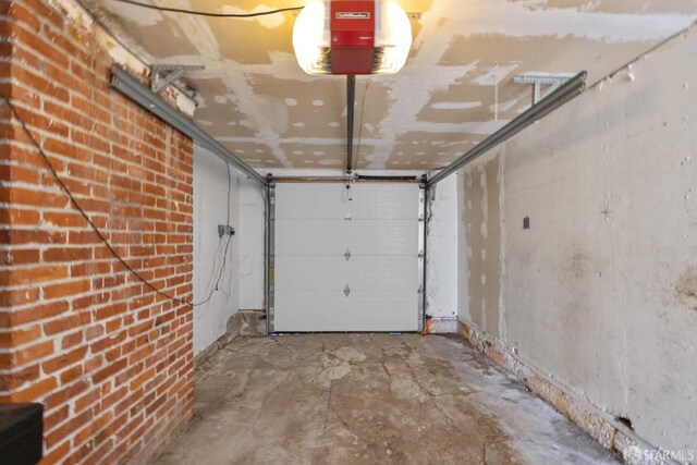 garage featuring a garage door opener