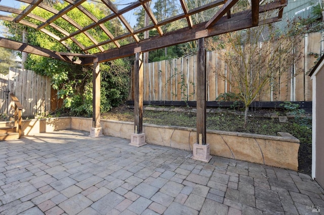 view of patio featuring a pergola