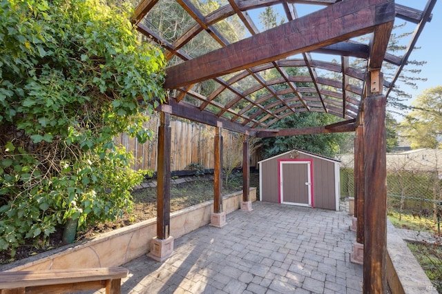 view of patio with a shed