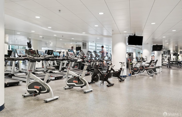 exercise room with a healthy amount of sunlight and recessed lighting