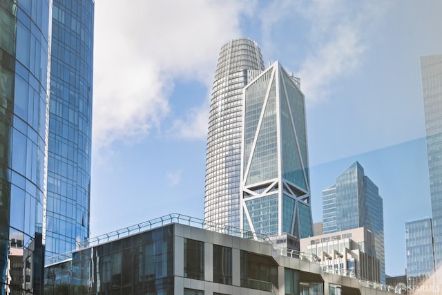 view of building exterior featuring a view of city