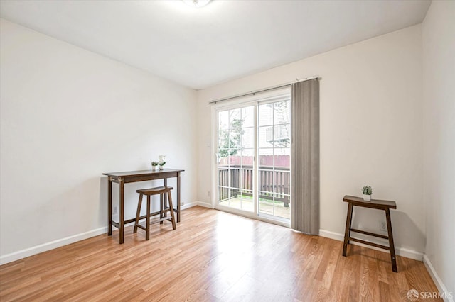 spare room with light wood-type flooring