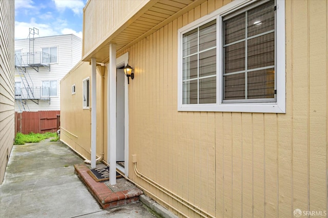 view of property exterior with a patio