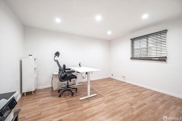 office space featuring light wood-type flooring