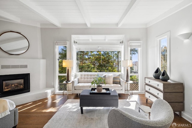 living room featuring beam ceiling, wooden ceiling, and dark hardwood / wood-style flooring