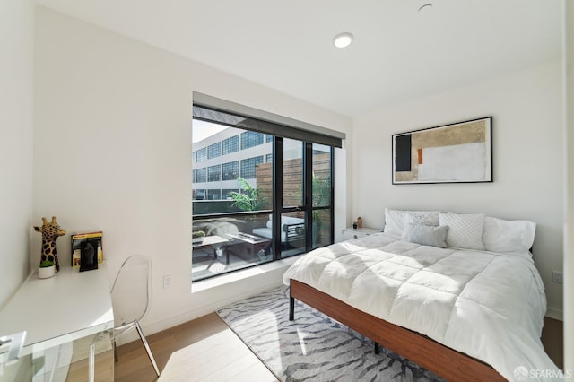 bedroom featuring light wood-type flooring