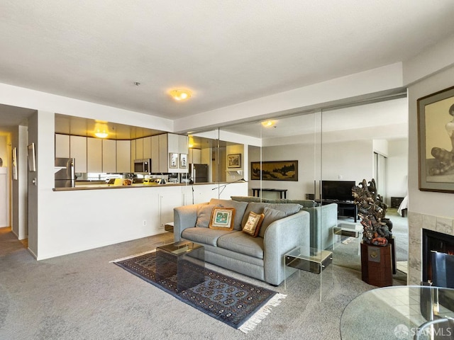 601 Van Ness Ave Unit 1047, San Francisco, CA 94102 - living room featuring carpet and a tiled fireplace