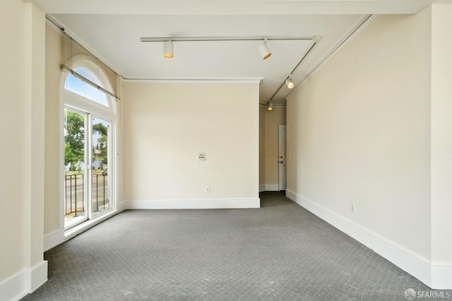 2108 Lakeshore Ave, Oakland, CA 94606 - spare room featuring track lighting and carpet