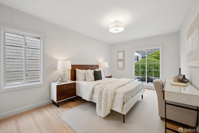 1867 15th Ave, San Francisco, CA 94122 - bedroom featuring light wood-type flooring and baseboards