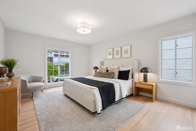 1867 15th Ave, San Francisco, CA 94122 - bedroom with light wood-style floors and baseboards