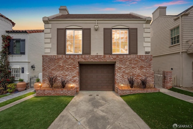 1867 15th Ave, San Francisco, CA 94122 - view of front of home featuring concrete driveway, stucco siding, a garage, brick siding, and a chimney