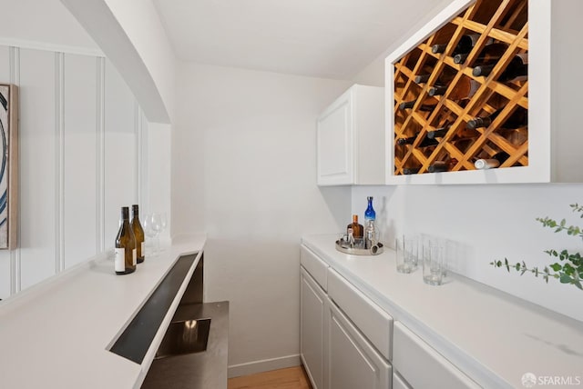 1867 15th Ave, San Francisco, CA 94122 - indoor dry bar featuring arched walkways and light wood-type flooring