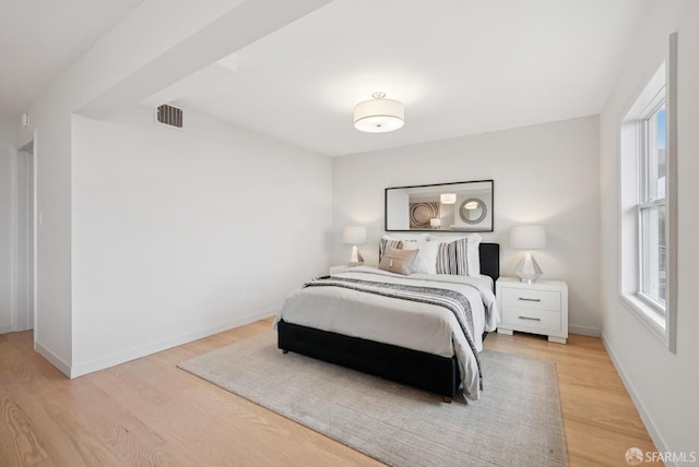 1867 15th Ave, San Francisco, CA 94122 - bedroom featuring light wood-style flooring and baseboards