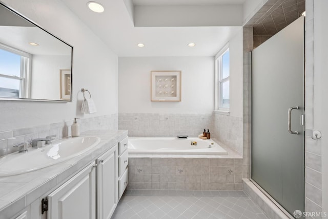 1867 15th Ave, San Francisco, CA 94122 - bathroom with vanity, a bath, tile patterned flooring, a shower stall, and recessed lighting