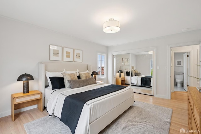 1867 15th Ave, San Francisco, CA 94122 - bedroom featuring light wood finished floors and a closet