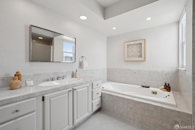 1867 15th Ave, San Francisco, CA 94122 - bathroom featuring vanity, a garden tub, tile patterned floors, and recessed lighting