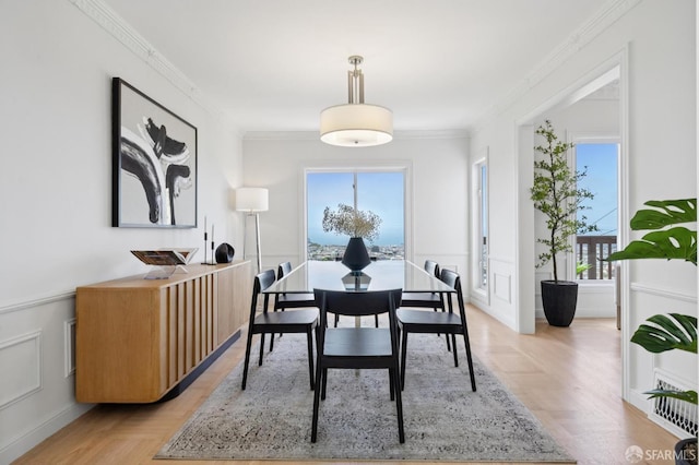 1867 15th Ave, San Francisco, CA 94122 - dining area featuring plenty of natural light, ornamental molding, and light wood-style floors