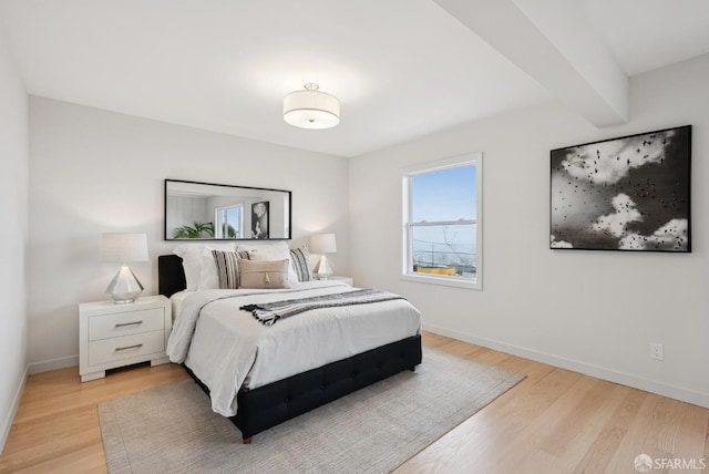 1867 15th Ave, San Francisco, CA 94122 - bedroom with light wood-type flooring and baseboards