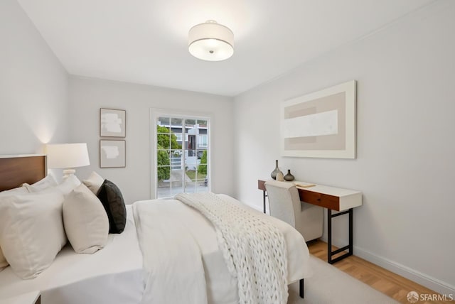 1867 15th Ave, San Francisco, CA 94122 - bedroom with light wood-style floors and baseboards