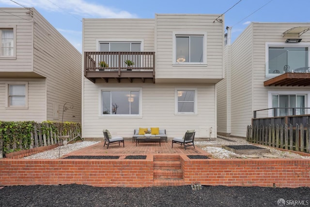 1867 15th Ave, San Francisco, CA 94122 - back of house with outdoor lounge area, a balcony, and a patio