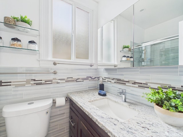 65 Danton St, San Francisco, CA 94112 - bathroom featuring vanity, decorative backsplash, and an enclosed shower