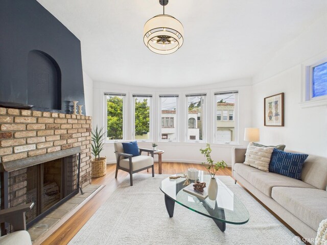 65 Danton St, San Francisco, CA 94112 - living area with wood finished floors and a fireplace