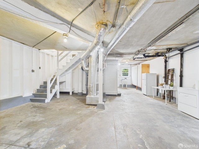 65 Danton St, San Francisco, CA 94112 - below grade area with washer / dryer, freestanding refrigerator, and stairs