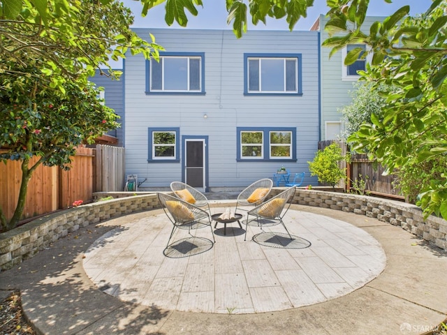 65 Danton St, San Francisco, CA 94112 - rear view of house featuring a patio area and a fenced backyard