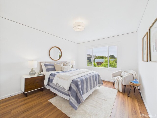 65 Danton St, San Francisco, CA 94112 - bedroom featuring baseboards and wood finished floors