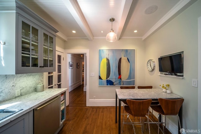 kitchen featuring gray cabinets, hanging light fixtures, light stone countertops, dark wood-type flooring, and beam ceiling