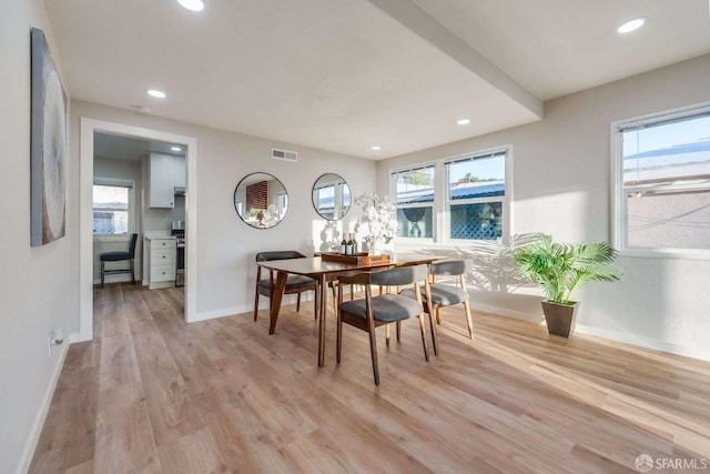 dining area with light wood-style flooring, recessed lighting, baseboards, and visible vents