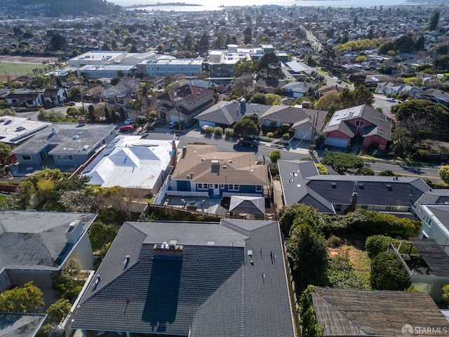 birds eye view of property with a residential view