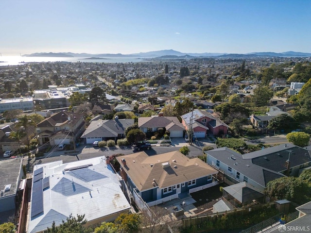 drone / aerial view featuring a mountain view and a residential view