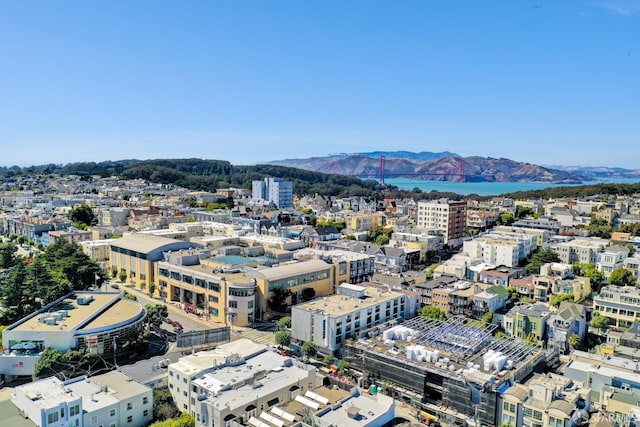 birds eye view of property with a mountain view