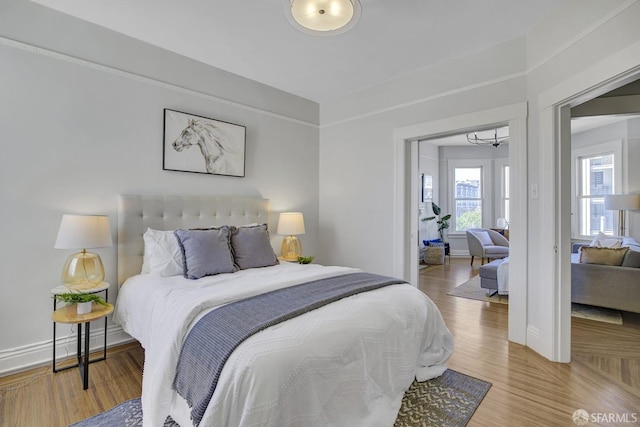 bedroom featuring wood-type flooring