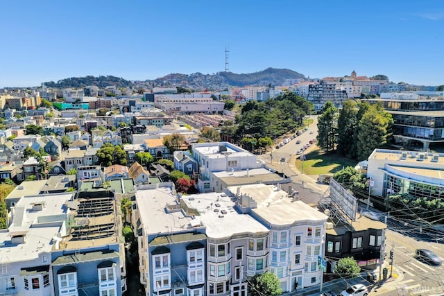 birds eye view of property featuring a mountain view