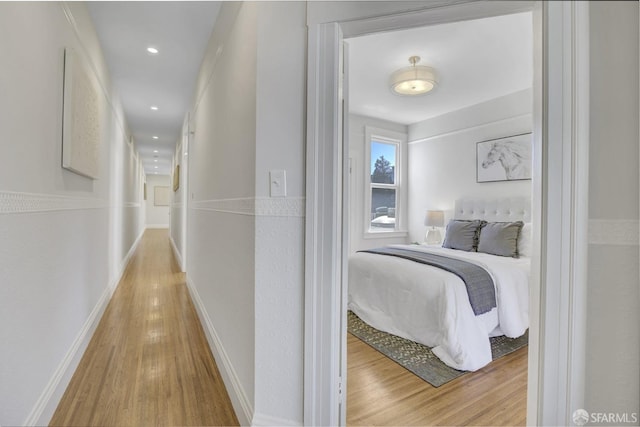 bedroom featuring light wood-type flooring