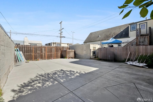 view of patio / terrace with fence