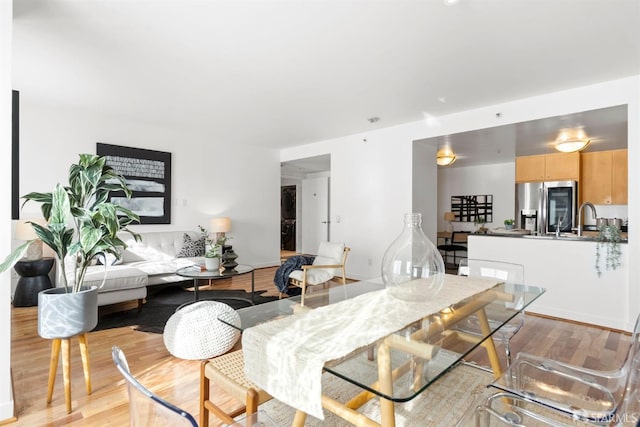 dining room featuring light wood-style flooring