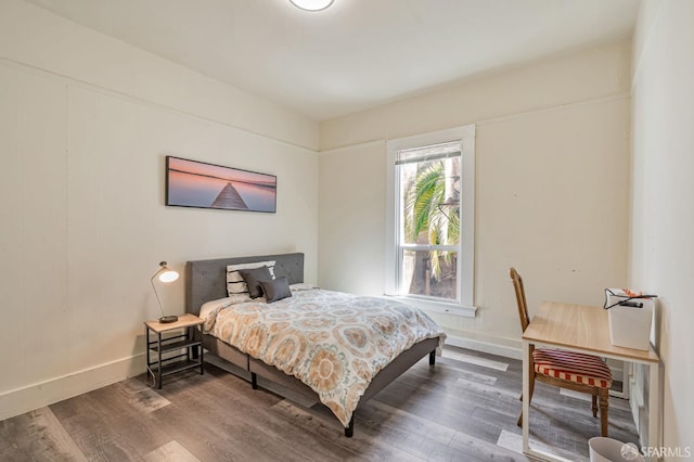3233 Ellis St, Berkeley, CA 94703 - bedroom featuring wood finished floors and baseboards