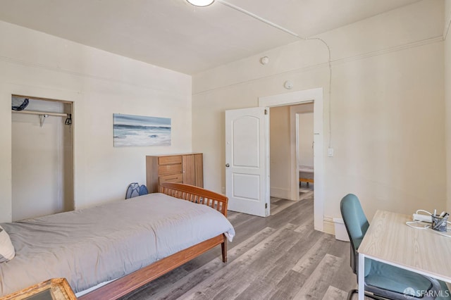 3233 Ellis St, Berkeley, CA 94703 - bedroom with wood finished floors and an office area