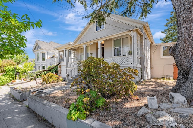 3233 Ellis St, Berkeley, CA 94703 - view of front of property featuring a porch and stairs