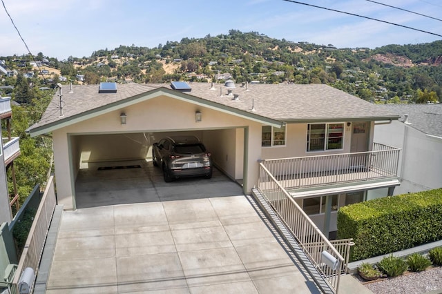 single story home with a carport