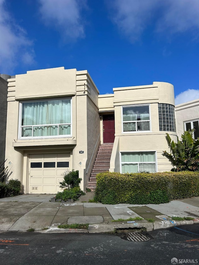 view of front of home with a garage