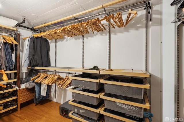 walk in closet featuring wood-type flooring